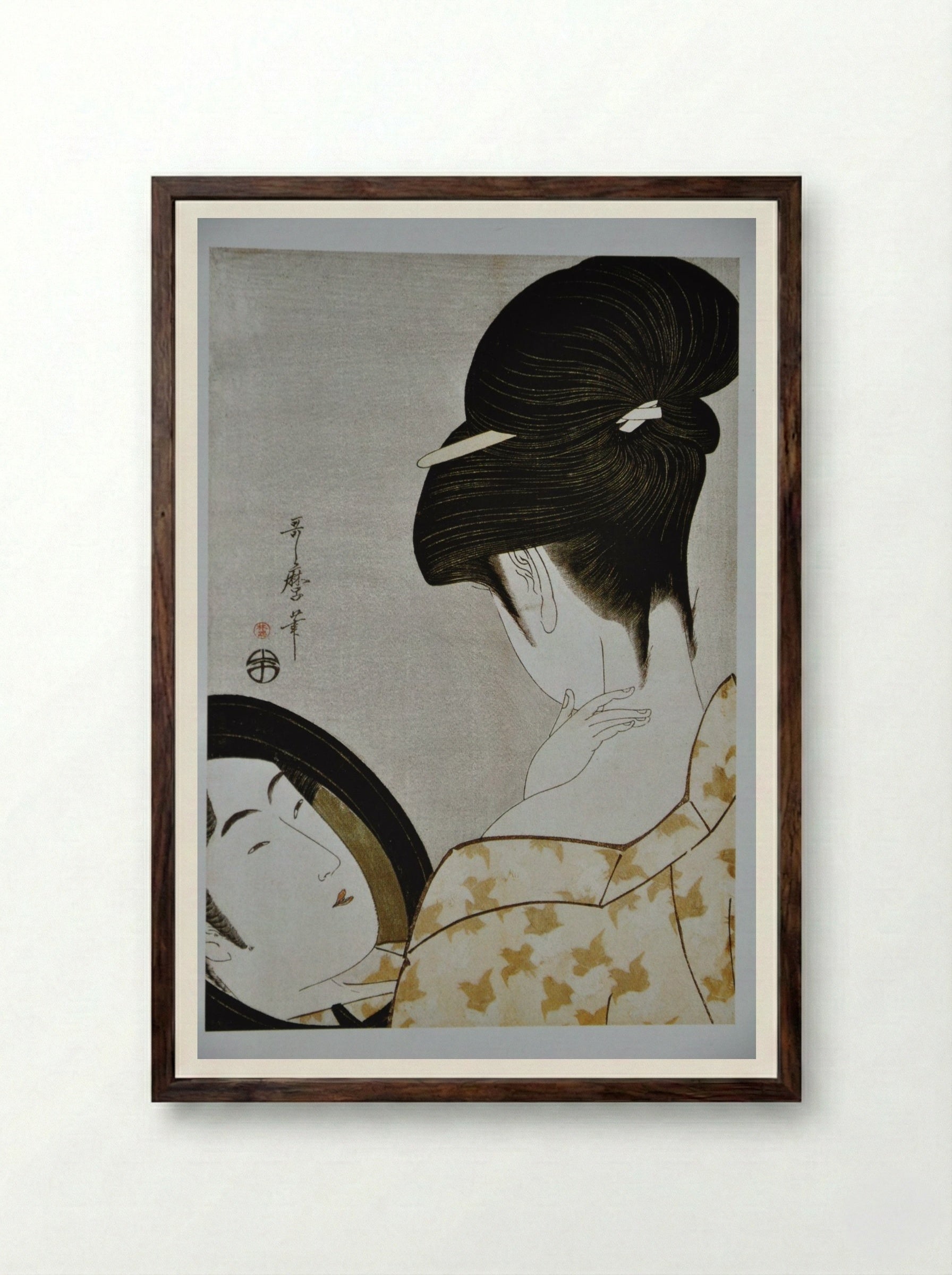 Young Woman Applying Makeup - Kitagawa Utamaro - Framed Print Dark Wood