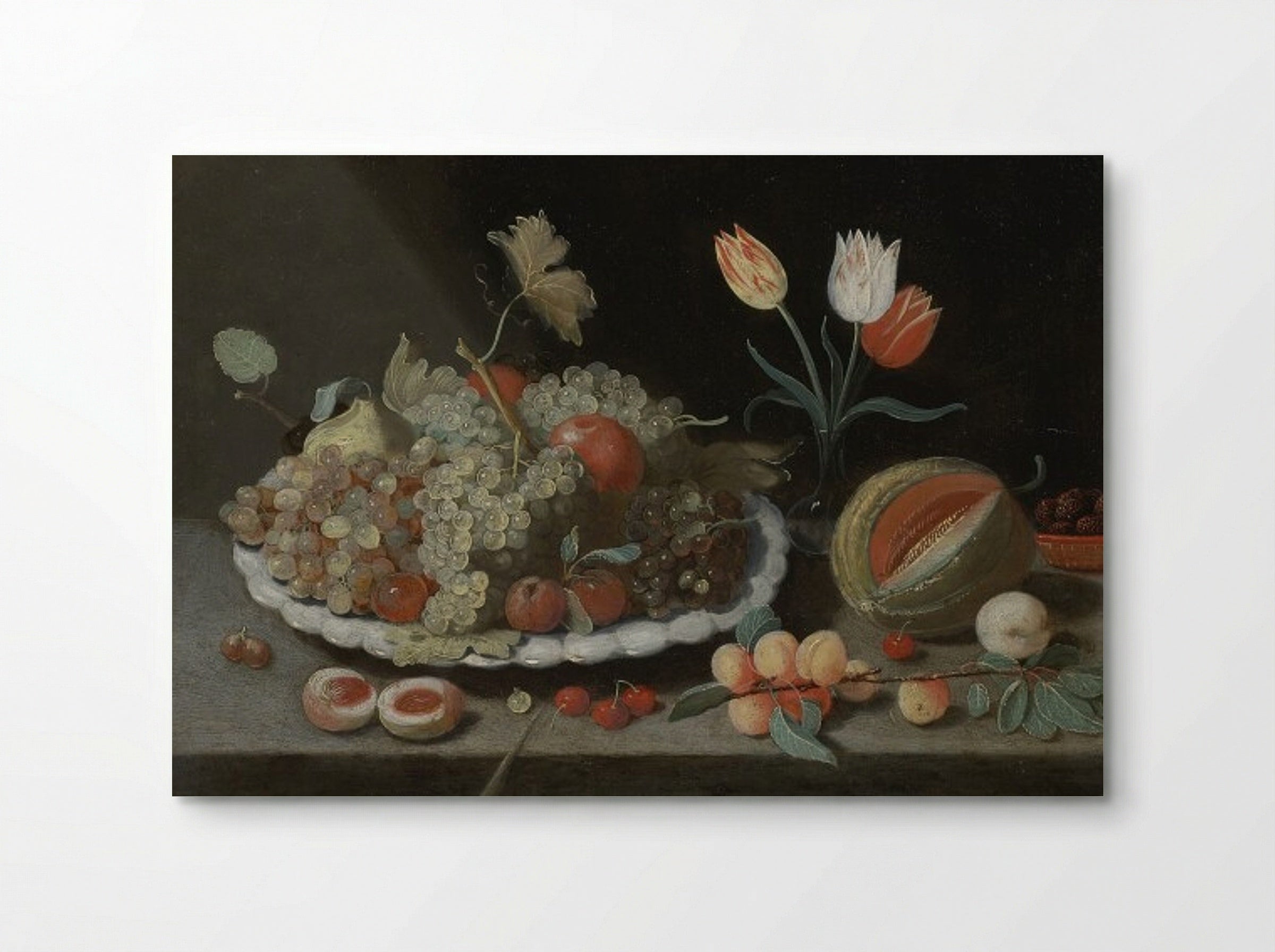 Still life with grapes and other fruit on a platter, a glass vase with tulips, a melon, apricots, cherries and other fruit, all on a ledge - Jan van Kessel the Elder - Poster
