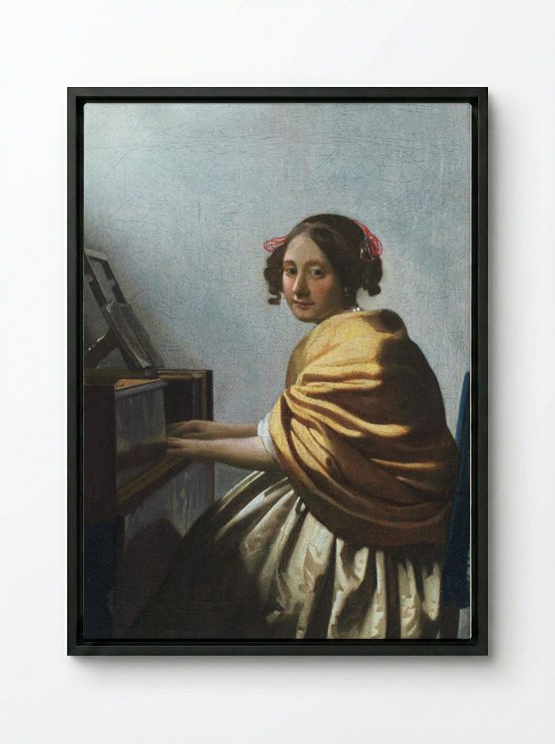 A Young Woman Seated at the Virginals - Johannes Vermeer - Framed Canvas Black