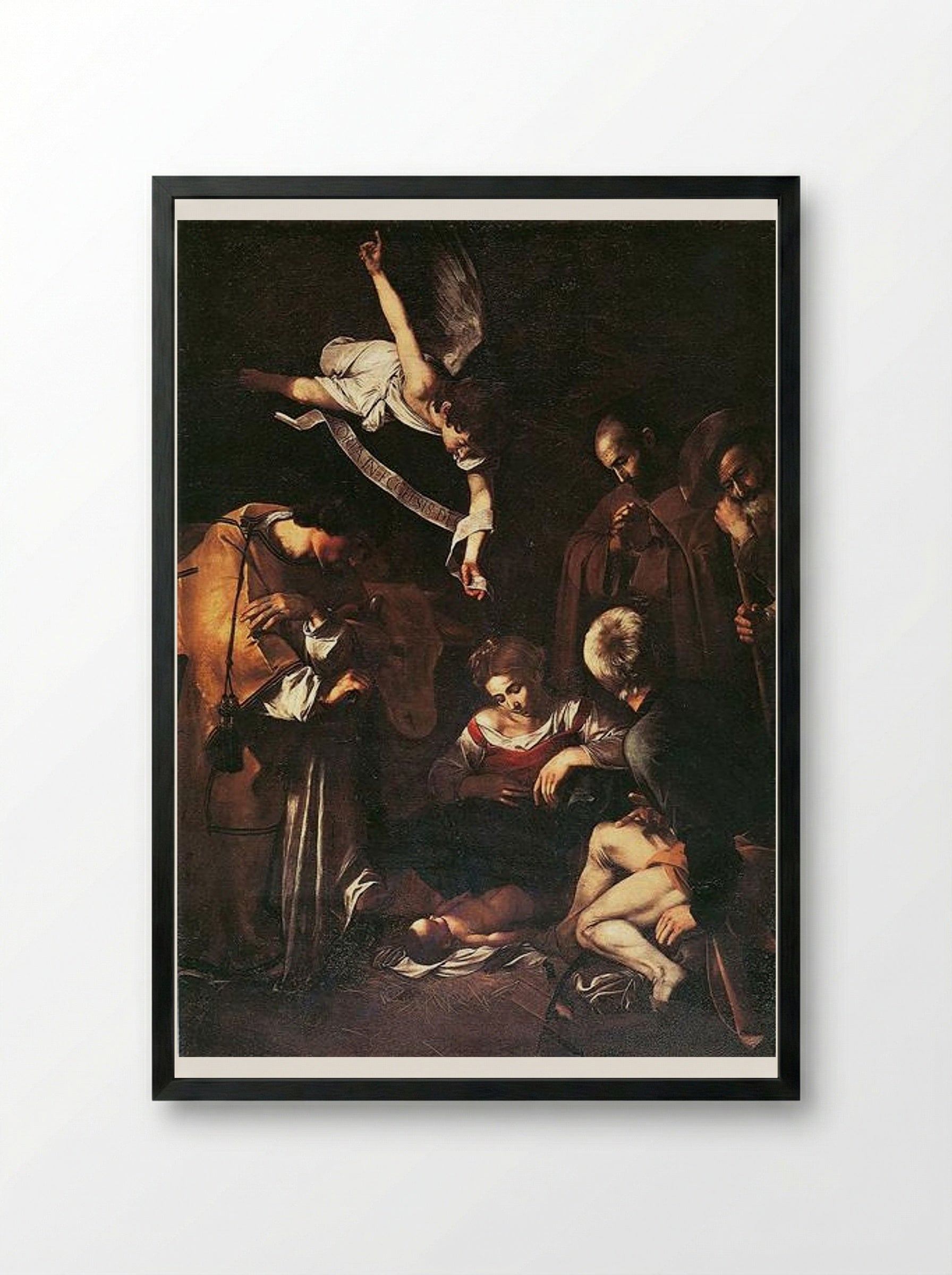 Nativity with St. Francis and St. Lawrence - Caravaggio - Framed Print Black