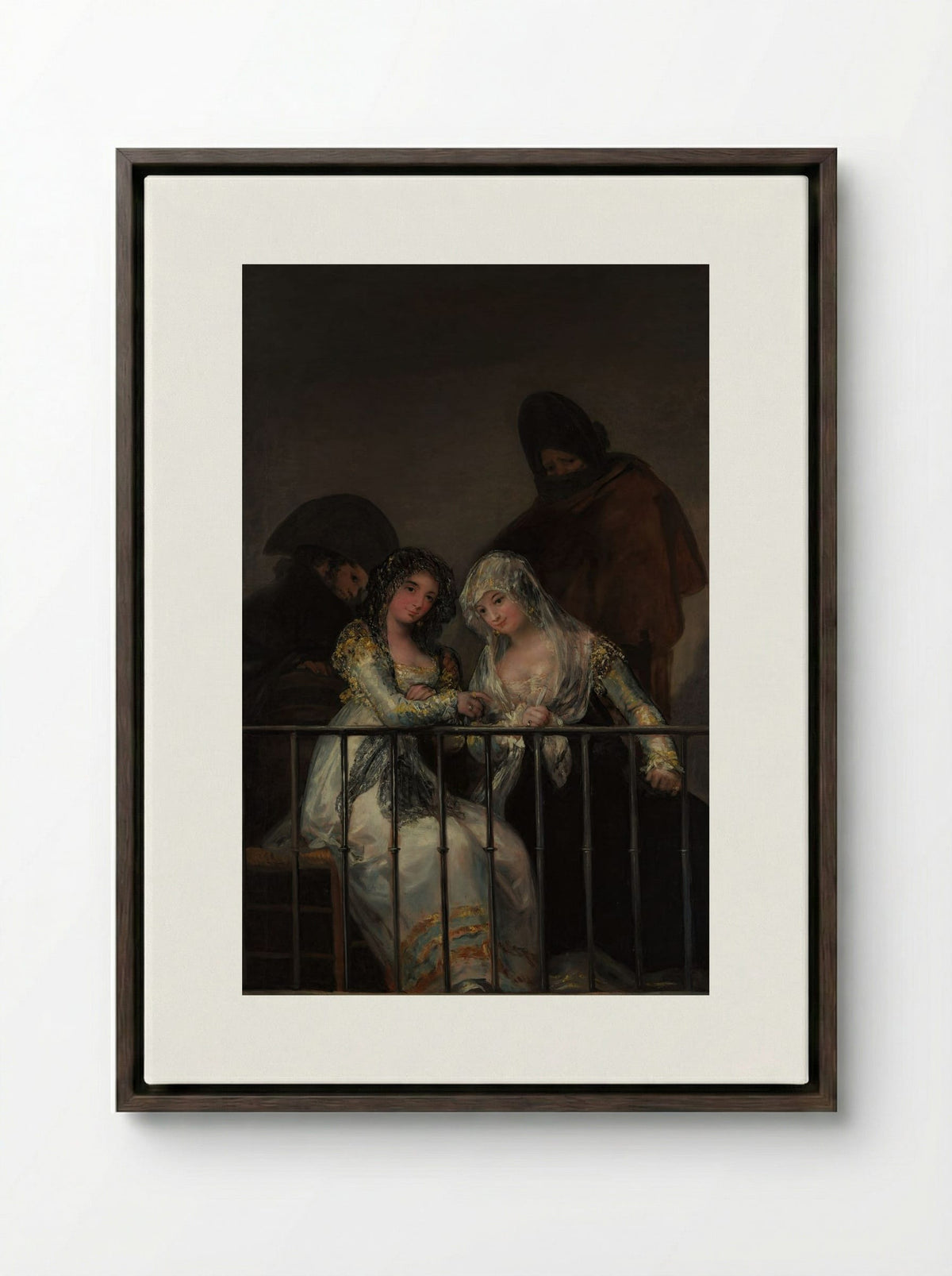 Majas on a Balcony - Francisco de Goya - Framed Canvas Dark Wood