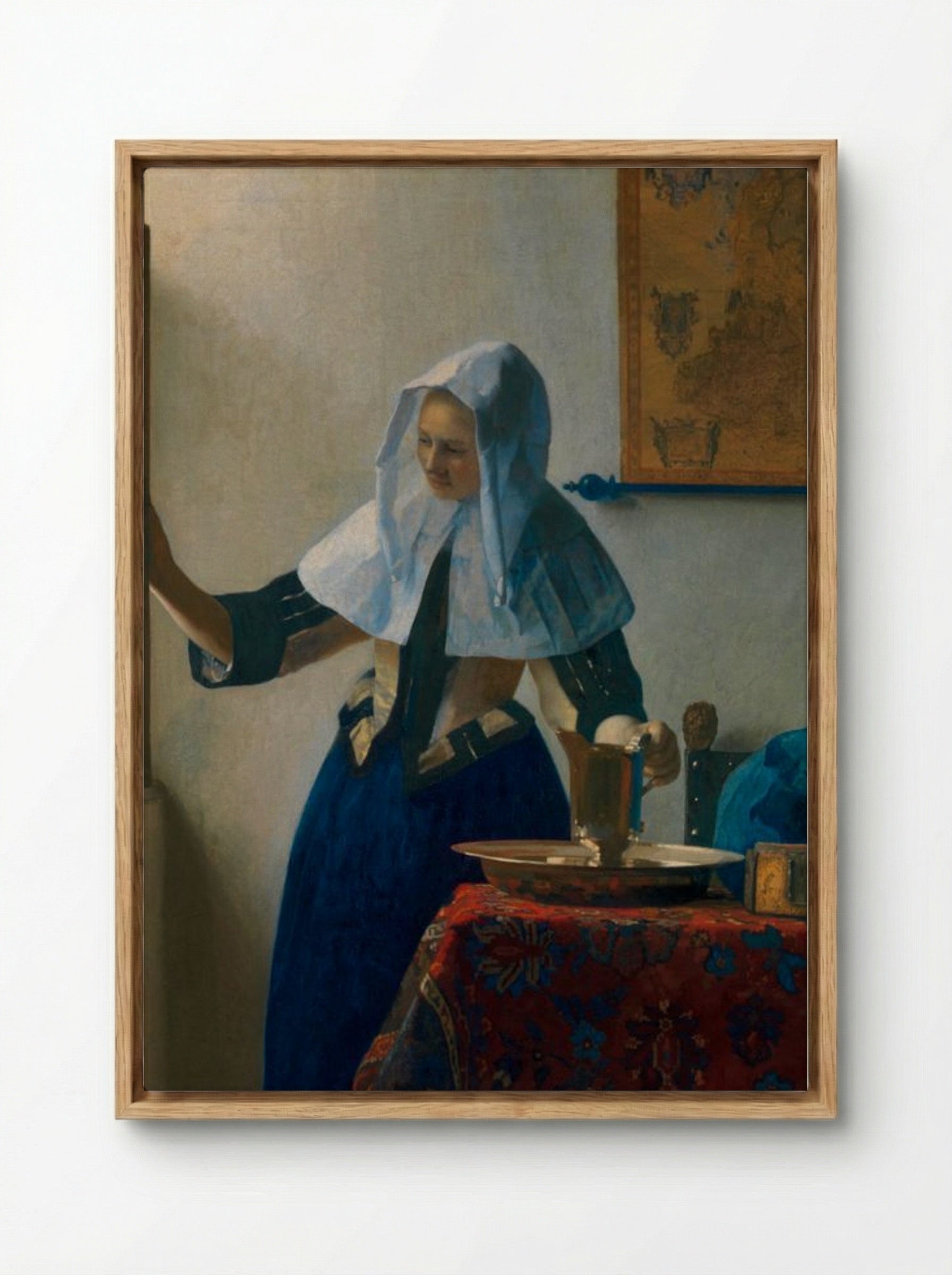 Young Woman with a Water Pitcher - Johannes Vermeer - Framed Canvas Wood
