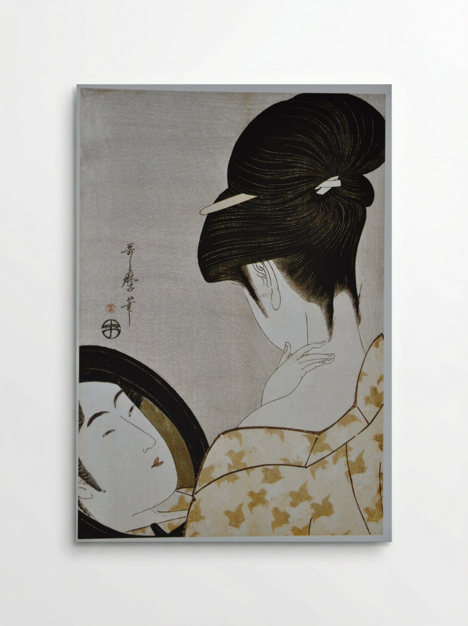 Young Woman Applying Makeup - Kitagawa Utamaro - Poster