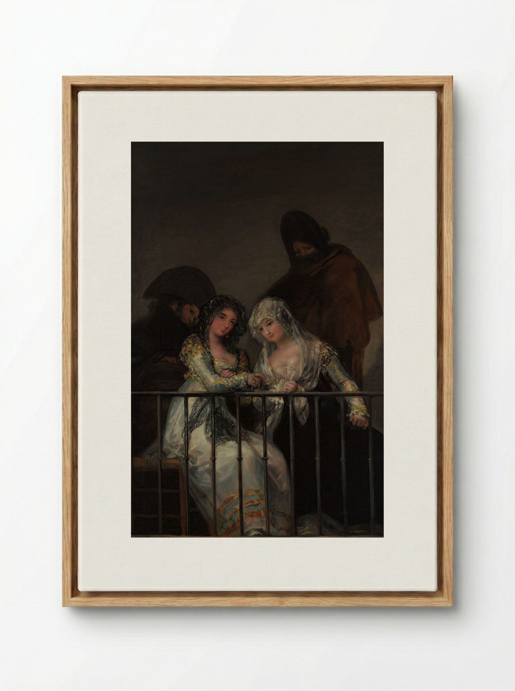 Majas on a Balcony - Francisco de Goya - Framed Canvas Wood