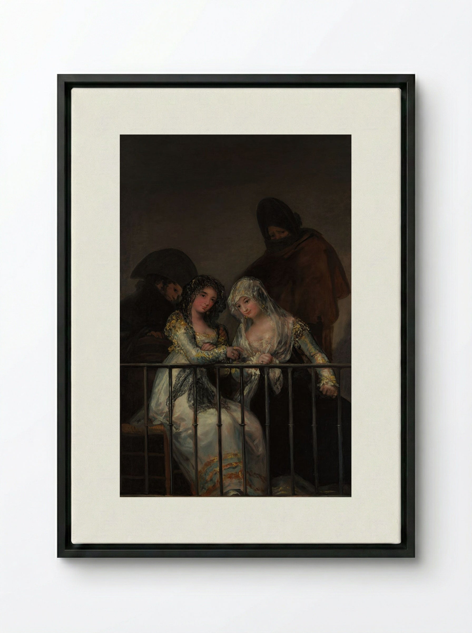 Majas on a Balcony - Francisco de Goya - Framed Canvas Black