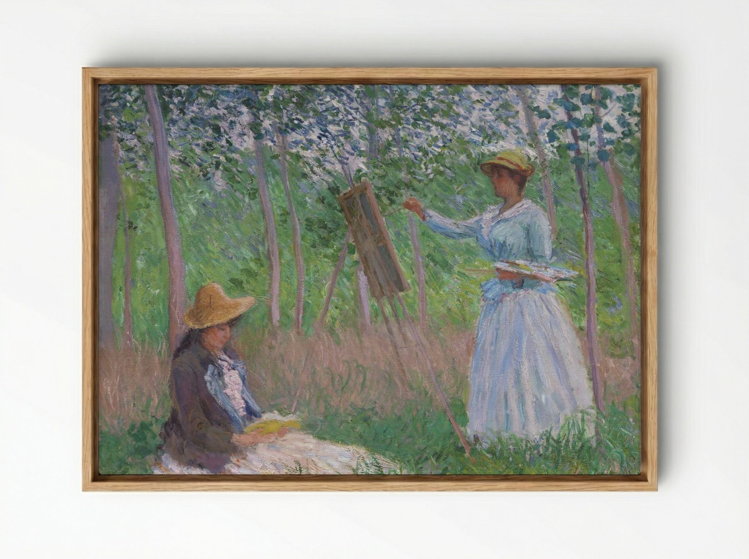 Blanche Hoschedé at Her Easel with Suzanne Hoschedé Reading - Claude Monet - Framed Canvas Wood
