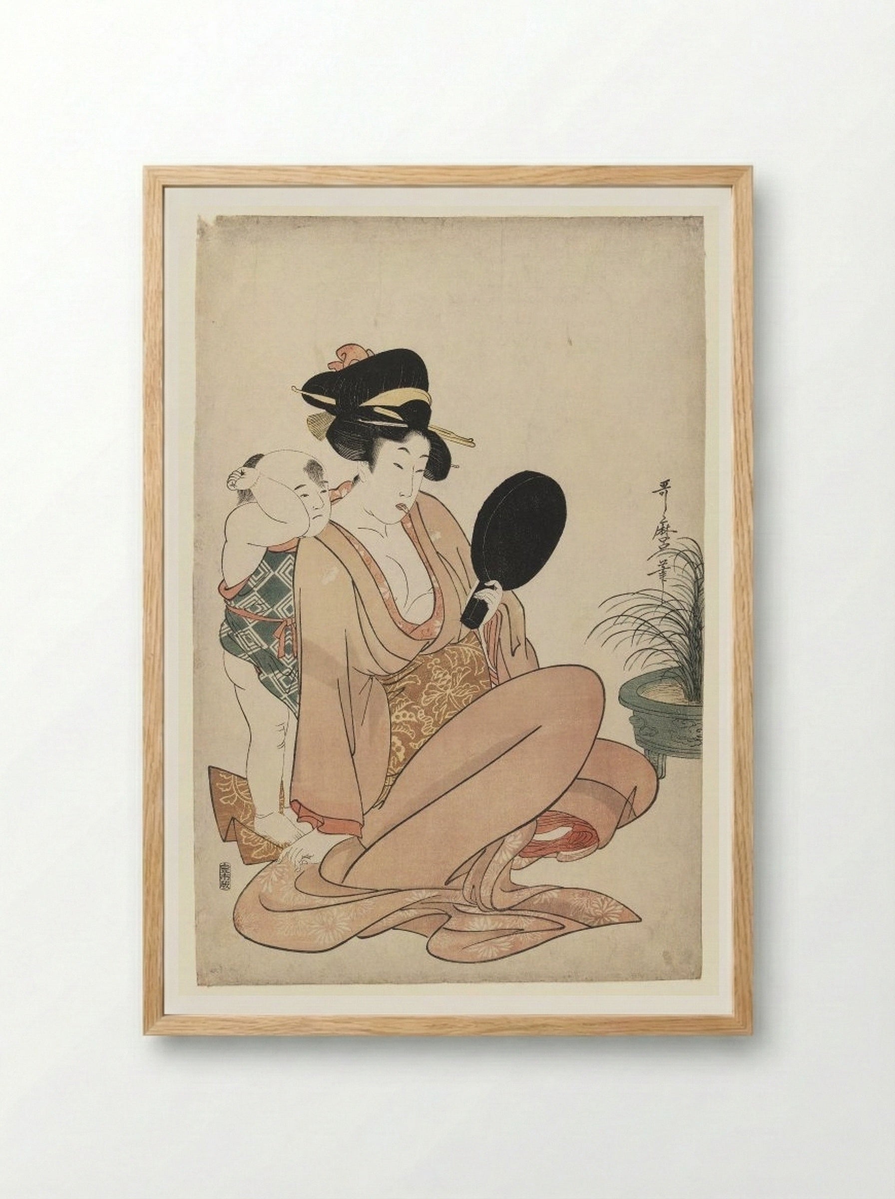 Mother and Child Gazing at a Hand Mirror - Kitagawa Utamaro - Framed Print Wood
