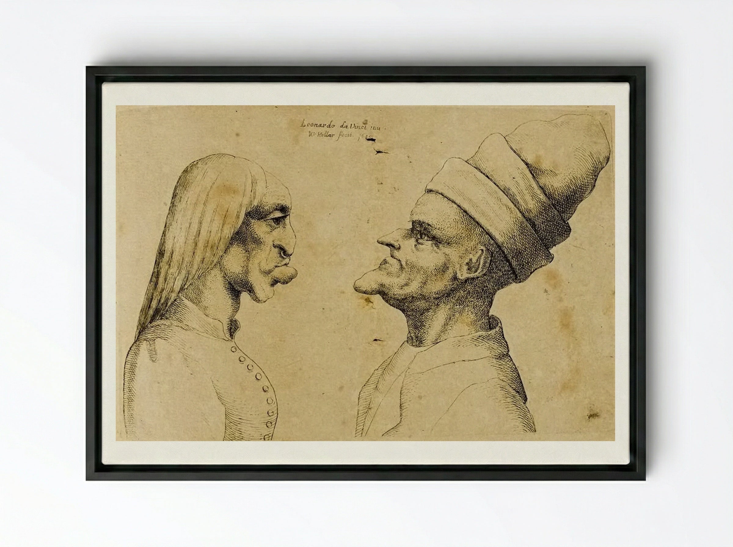Two Deformed Heads Facing Each Other - Wenceslaus Hollar - Framed Canvas Black