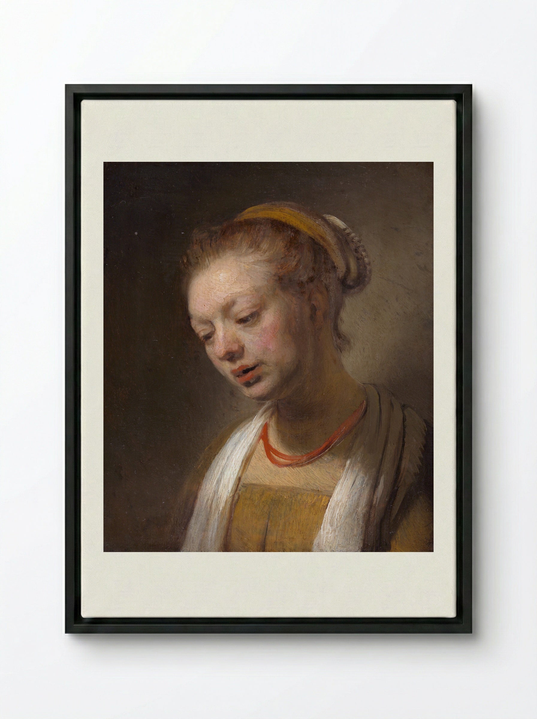 Young Woman with a Red Necklace - Rembrandt van Rijn - Framed Canvas Black