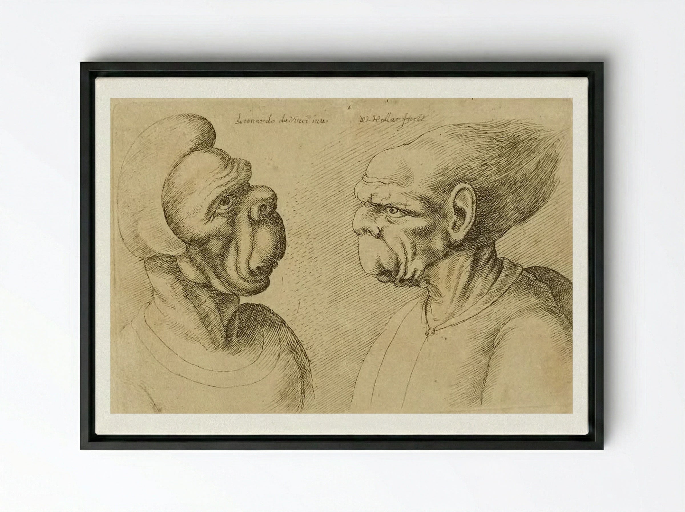 Two Deformed Heads Facing Inward - Wenceslaus Hollar - Framed Canvas Black