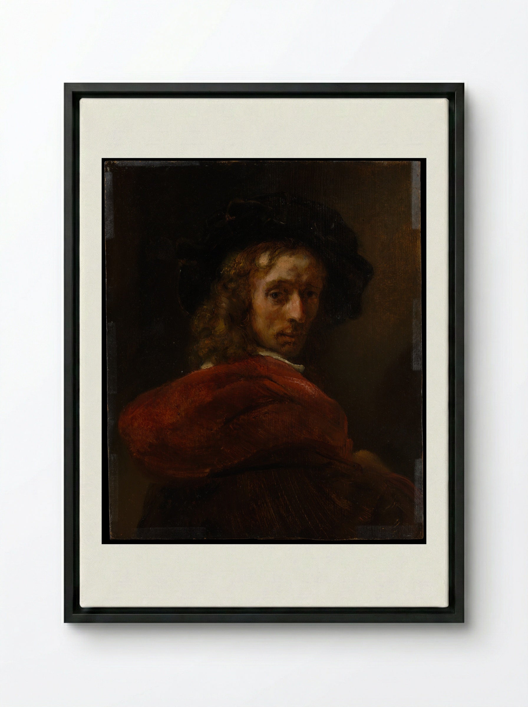 Man in a Red Cloak - Rembrandt van Rijn - Framed Canvas Black