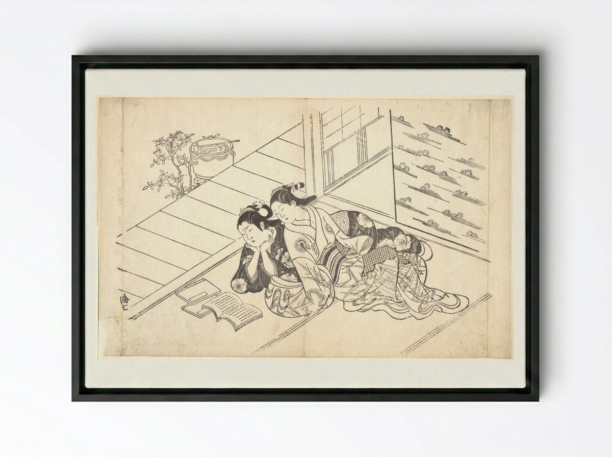 Two Women Reclining on the Floor of a Room and Reading a Book - Nishikawa Sukenobu - Framed Canvas Black