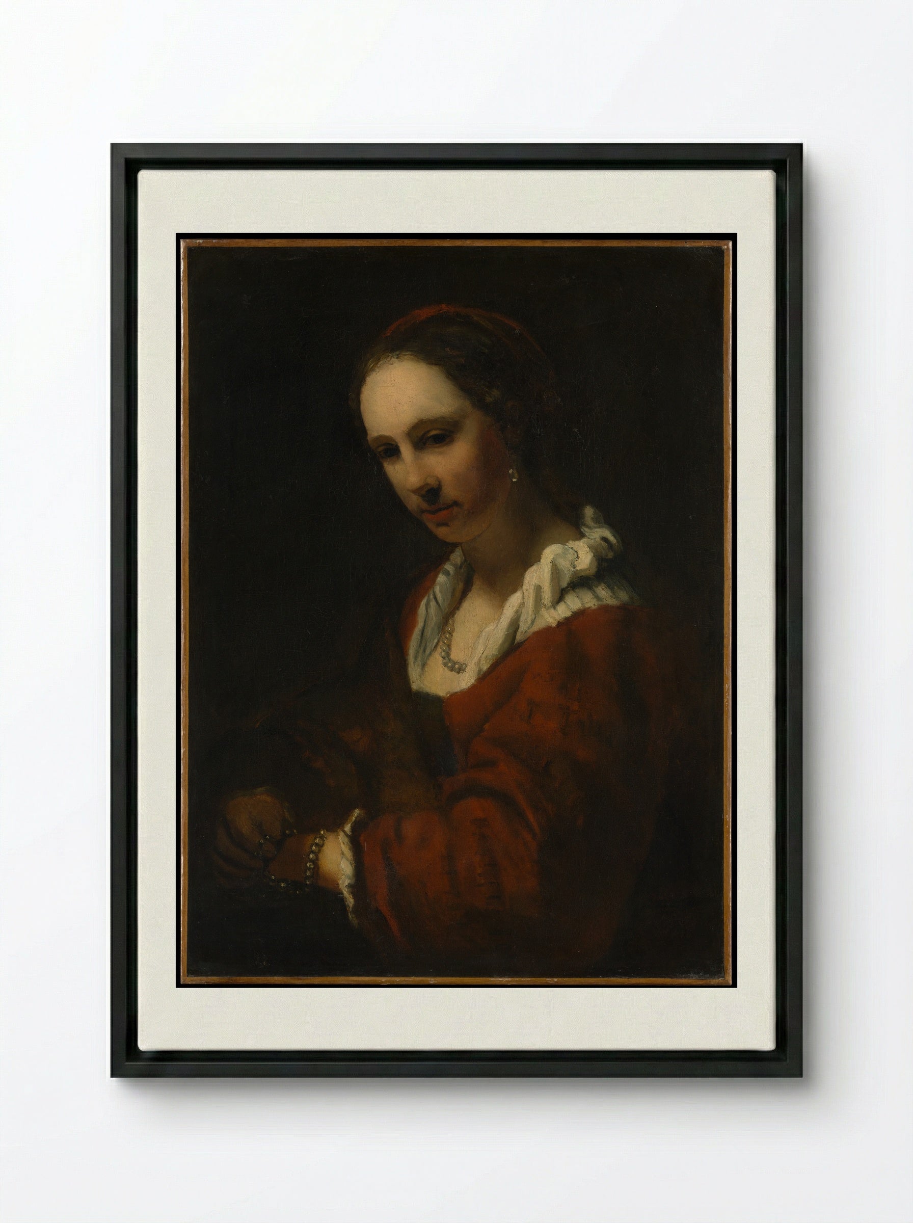 Young Woman with a Pearl Necklace - Willem Drost - Framed Canvas Black