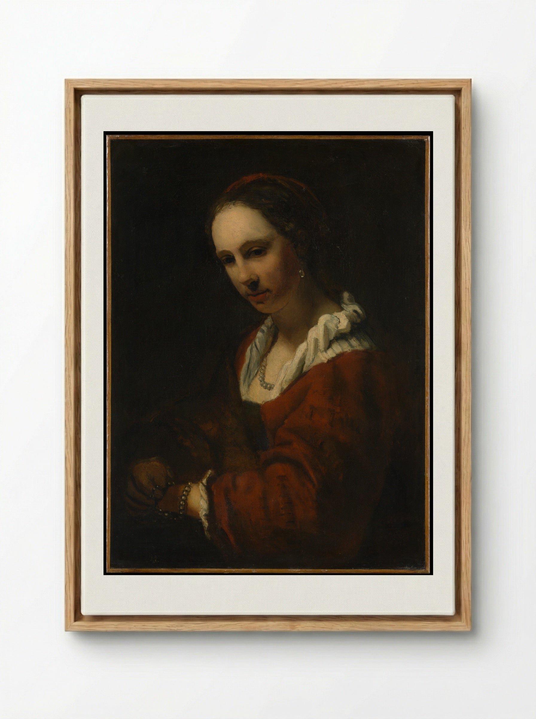 Young Woman with a Pearl Necklace - Willem Drost - Framed Canvas Wood