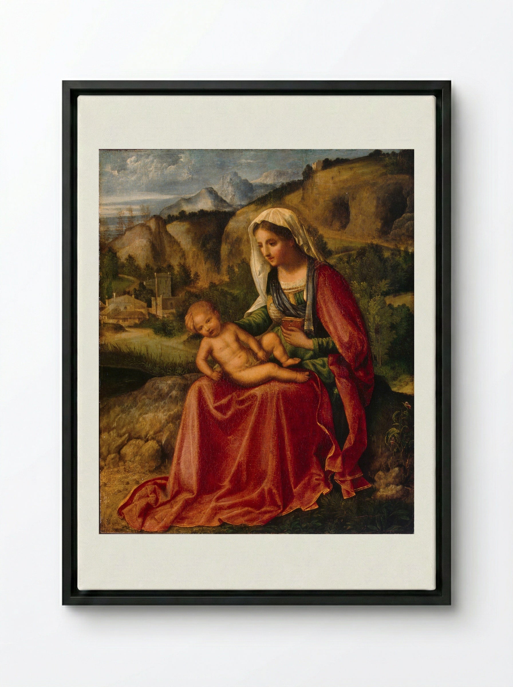 Madonna and Child in a Landscape - Giorgione - Framed Canvas Black